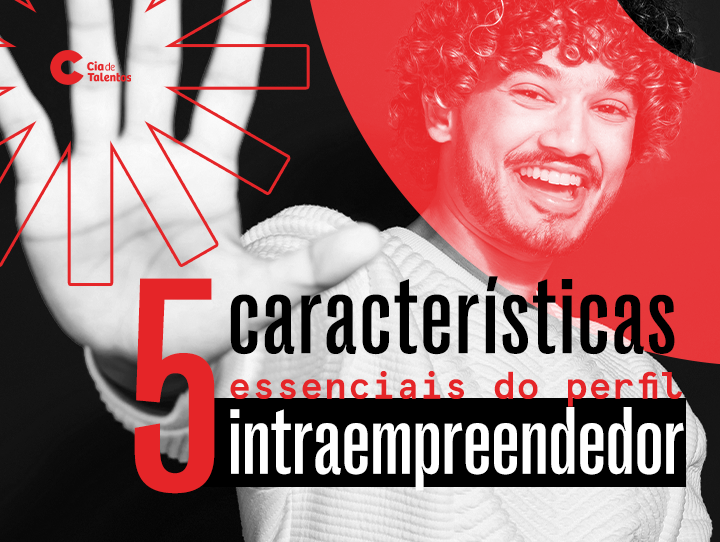 A imagem que ilustra o artigo 5 características do perfil intraempreendedor traz um rapaz sorridente de fundo. Ele tem cabelos cacheados e barba e está com a mão esticada, em direção à câmera.