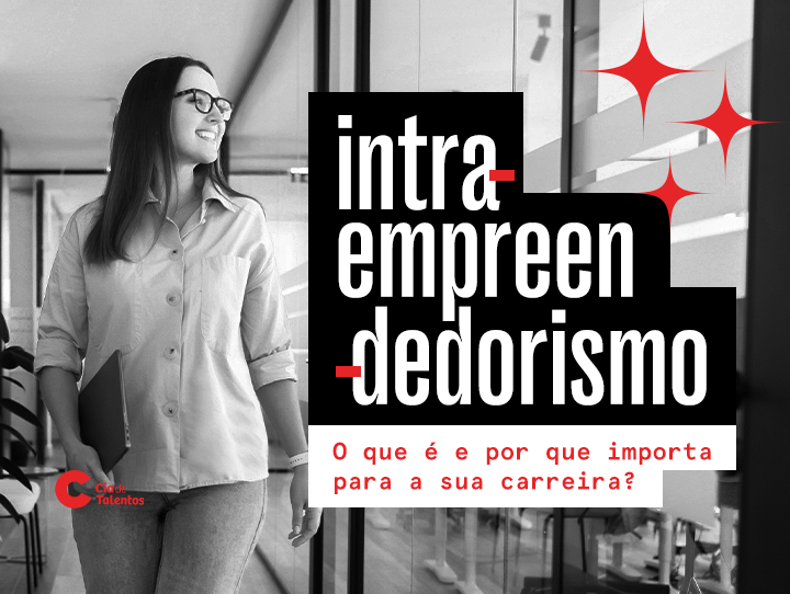 A imagem que ilustra o artigo Intraempreendedorismo o que é e por que importa para a sua carreira, traz à esquerda, a foto em preto e branco de uma jovem caminhando por um escritório. Ela é branca, tem cabelos lisos e escuros até a altura dos ombros, veste camisa e calça jeans e segura um computador em uma das mãos.